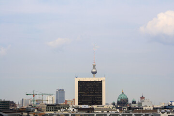 Berlin cityscape in summer with view of the famous Berlin TV tower, Berliner Dom and International Trade Centre. Clear blue sky background. No people. 