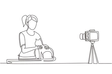 Continuous one line drawing vet blogger sitting in front of camera with cats and recording video blog about animals, pets. Zoo psychologist creating content for vlog. Single line draw design vector