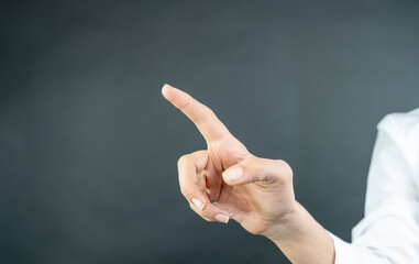 Business wıoman touching concepts in studio. Business woman pushing on a touch screen interface 