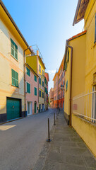 Traditional colors of the house, walls, doors, windows. Italy. - 459276460