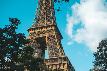 Eiffel Tower with trees against sky