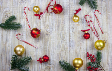 Christmas, rosette on a wooden background of New Year's toys gifts.