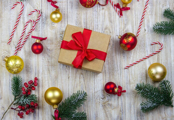 Christmas, rosette on a wooden background of New Year's toys gifts.