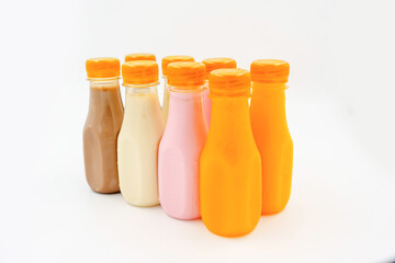 Chocolate, Strawberries, Caramel milk and Orange juice in plastic bottle