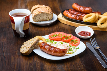 grilled sausage tasty fried egg and tomatoes