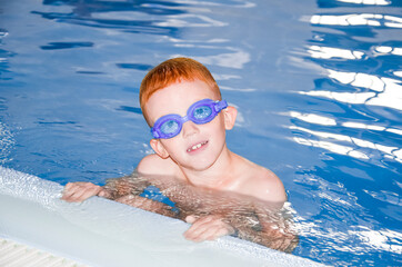Naklejka premium A child in the pool
