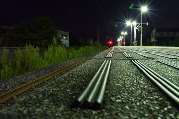 Image of train station lights at night.