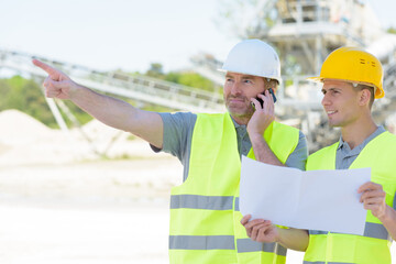 two builders on construction site