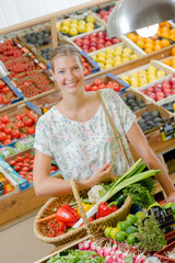 a woman is buying food