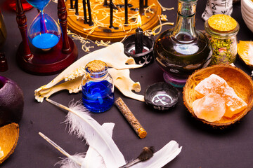 Witchcraft still life with black burning candles selective focus. Esoteric gothic and occult witch...