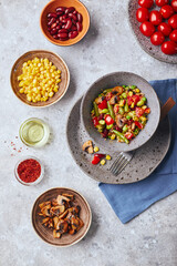 Quinoa with green beans, tomatoes, fried champignons, corn, red bell peppers, peas and soybeans. Healthy Vegetable Mix