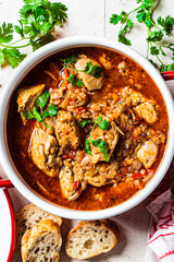 Chicken stew with vegetables - Chahohbili in a pot. Georgian cuisine concept.