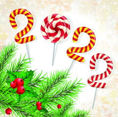 Christmas background 2022 of candy with snow and a Christmas tree