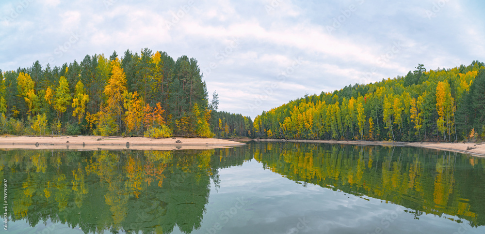 Wall mural panoramic view of the bright colorful trees along the bank of the kama river russia perm krai. autum
