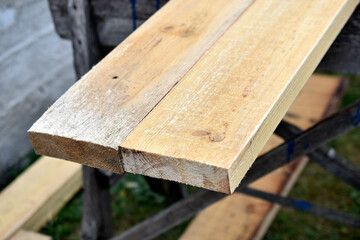 Pine white construction boards at the sawmill