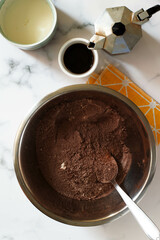 Chocolate cake preparation. White background