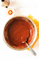 Chocolate cake preparation. White background