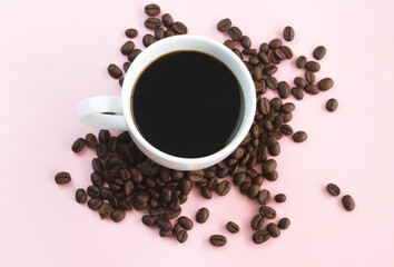 White ceramic cup with black coffee put on background