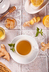 Refreshing ginger tea with lemon, mint leaf and honey