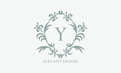 Exquisite design of an elegant monogram with the letter Y in the center in gray. Logo for boutiques, cafes, bars, restaurants, invitations. Business style and brand of the company