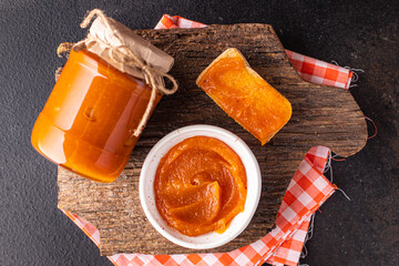 pumpkin jam jelly marmalade sweet dessert canned food fresh ready to eat meal snack on the table copy space food background rustic 