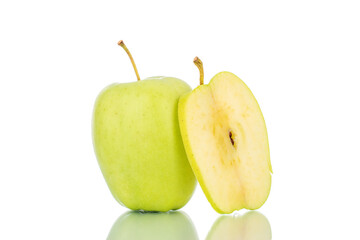 One slice and one ripe sweet apple, close-up, isolated on white.