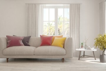 White living room with sofa and summer landscape in window. Scandinavian interior design. 3D illustration