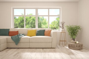 White living room with sofa and summer landscape in window. Scandinavian interior design. 3D illustration