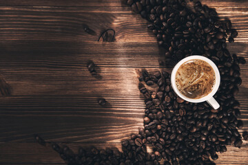 Coffee cup and coffee beans