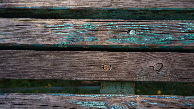 The Bars Of An Old Wooden Bench