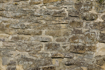 Texture of a stone wall. Old castle stone wall texture background. Stone wall as a background or texture. Part of a stone wall, for background or texture.