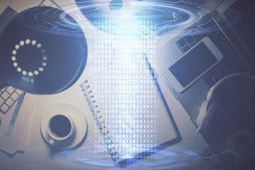 Double exposure of technology theme drawing over work table desktop. Top view. Global data analysis...