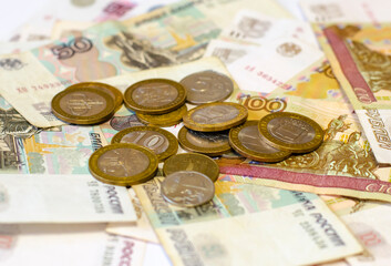 Coins and Russian banknotes lying on the table
