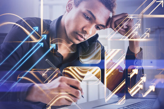 African American businessman wearing shirt is sitting and taking - Powered by Adobe