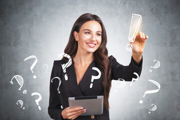 Smiling businesswoman wearing formal suit is touching exclamation mark