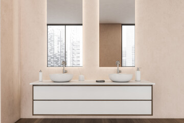 Fototapeta na wymiar Modern wall mounted bathroom vanity with pink background