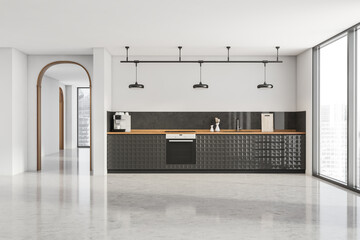 Stylish white kitchen space with on trend black cabinet