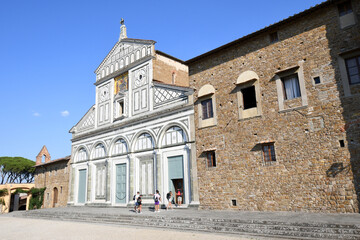 Fototapeta na wymiar Florence, September 2021: Tourists enter the famous leading to the Basilica of San Miniato which is located in one of the highest places in the city of Florence. Italy.
