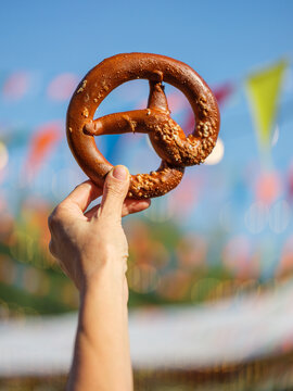 Close up pretzel - traditional snack bread in Europe. Fast food and street food concept background   