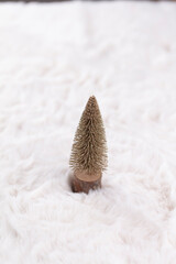 Christmas little trees and wool background