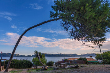 Landscape with sunset at S`illot, Bay of Pollenca, Mallorca.