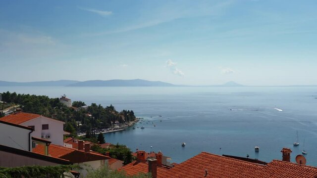 Arial view of the sea bay, on a summer sunny day, the movement of boats, Rabac, Istra, Croatia.