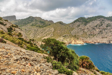 Landscape of rocky coast before a storm under gloomy dramatic sky