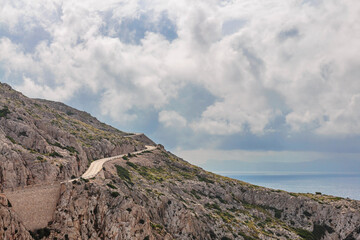 Landscape of rocky coast before a storm under gloomy dramatic sky