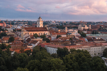 Fototapeta na wymiar VIlnius / Lithuania - August 12 2021: View over the Old Town of Vilnius in summer at sunset, amazing baltic touristic city in Lithuania, Europe
