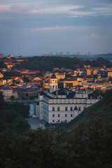 Obraz premium VIlnius / Lithuania - August 12 2021: View over the Old Town of Vilnius in summer at sunrise, amazing baltic touristic city in Lithuania, Europe