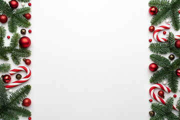 Christmas background with a frame decorated fir branches and Christmas balls
