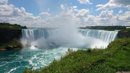 Photo of the beautiful Niagara Falls at day and night and different seasons in Ontario, Canada.