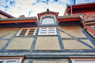 View to the German medieval town Dannenberg. You can see the facade of a historic house with half-timbered architecture.