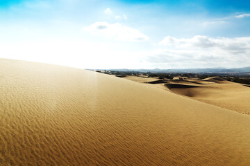 Blue sky and sand dunes. Sunny day.